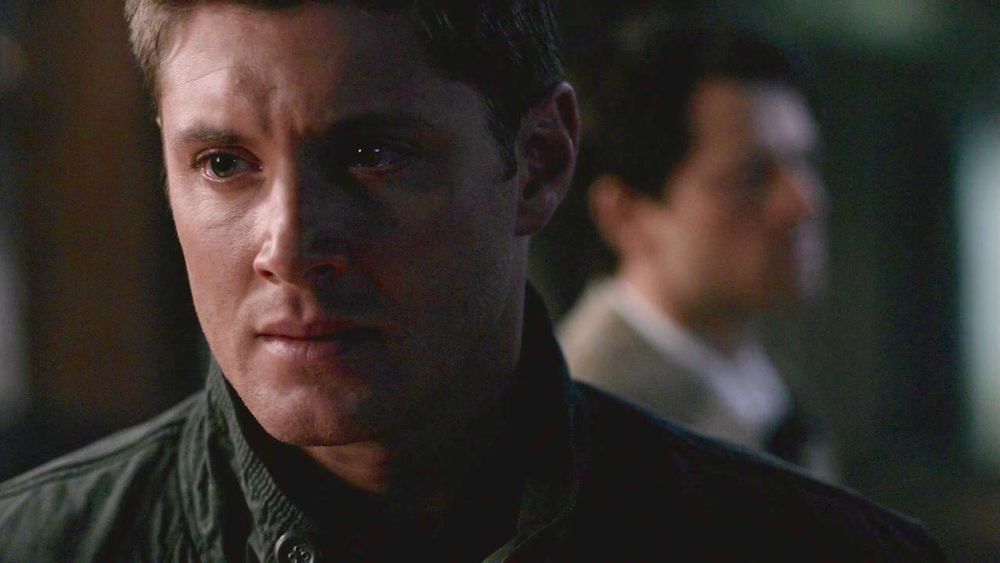 Closeup of Dean, On the Head of a Pin. Castiel is in the background.