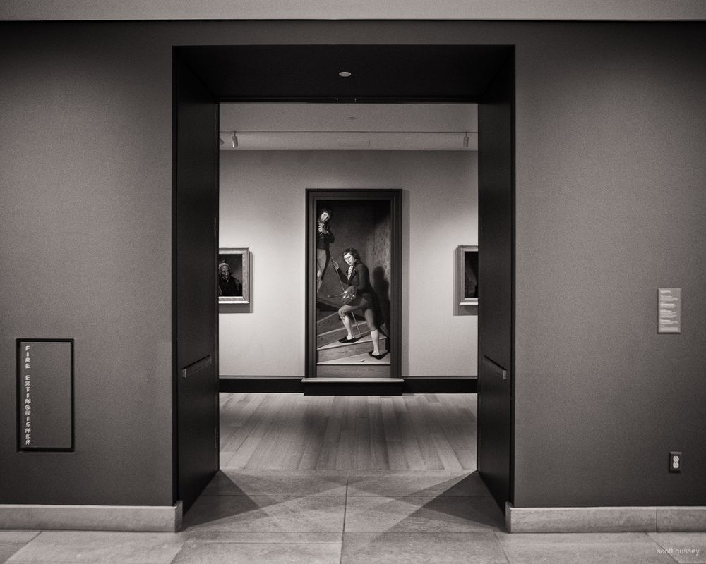 Portrait of Raphaelle Peale and Titian Ramsay Peale I, seen through a doorway.