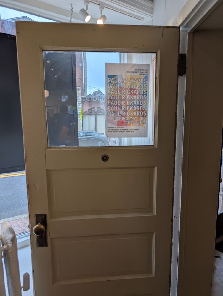 Doors and the poster for the exhibition 