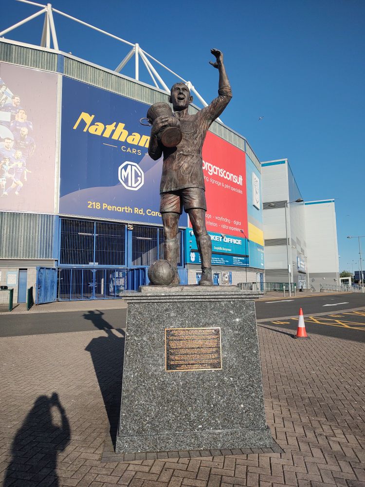 A statue of Frederick Charles Keenor outside Cardiff City Stadium.