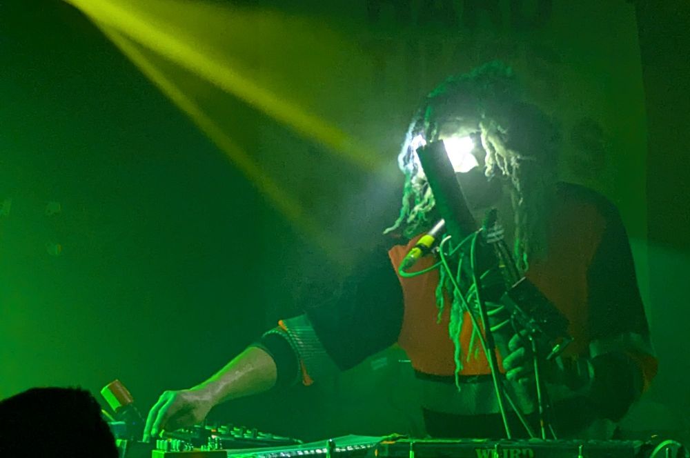 One of the Snapped Ankles fiddles with a sequencer, or something