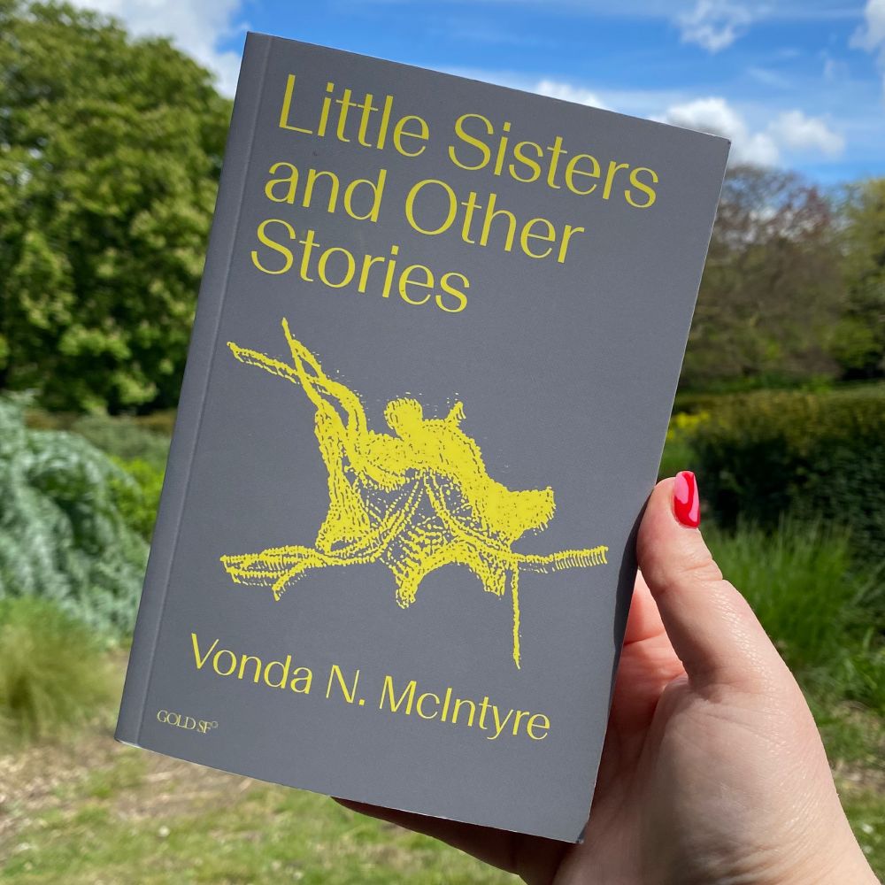 Grey book cover with yellow text and image. Reading "Little Sisters and Other Stories, Vonda N. McIntyre"