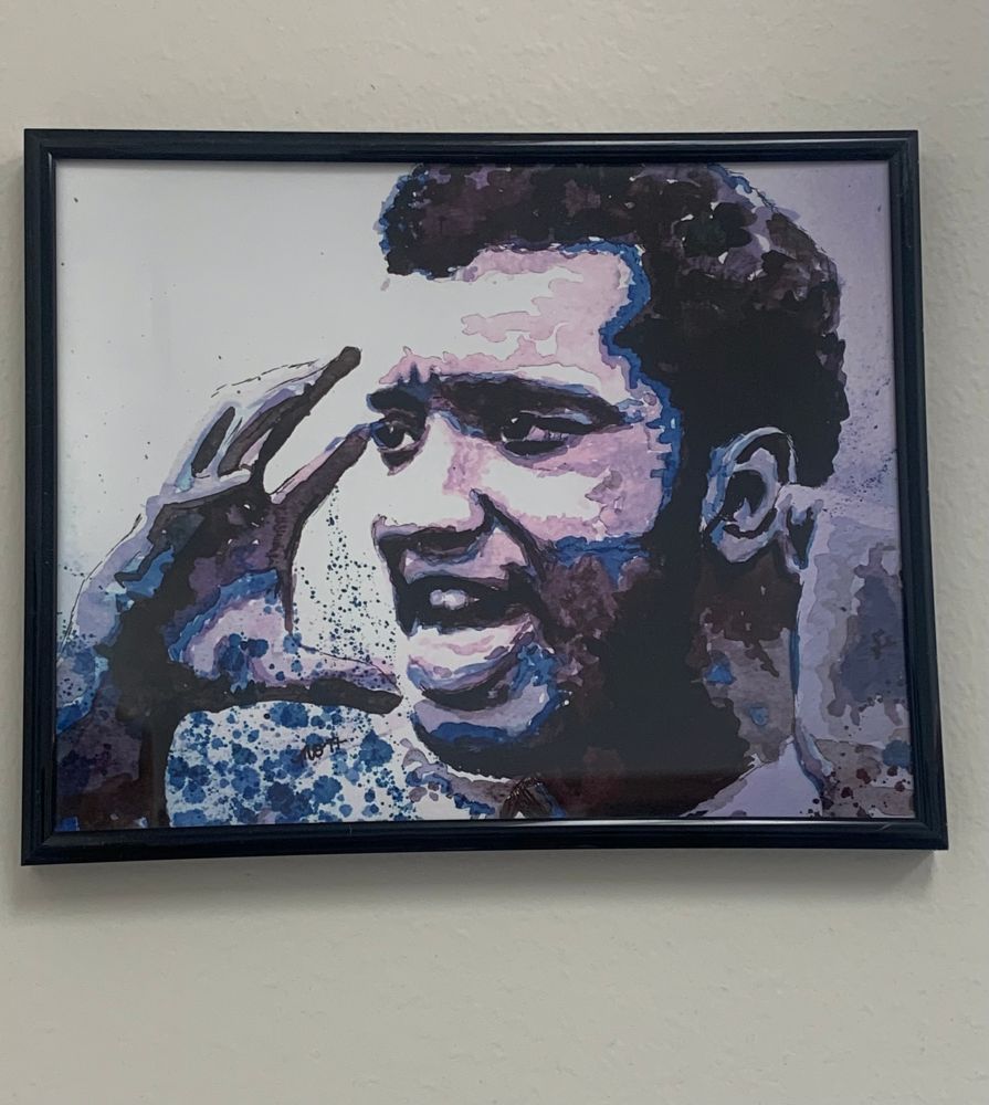 Framed painting of Chairman Fred Hampton, a hero. 
Artwork by @mointhestudio