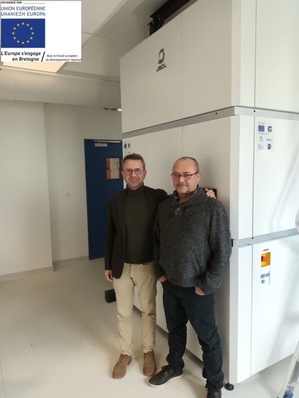 This image shows the new Cryo-electron microscope JEOL ARM 200 installed on the TEM2C platform in Rennes, France, together with Reynald Gillet (Left, Director of the Institute of Genetics and Development of Rennes), and Denis Chrétien (right, in charge of the project).