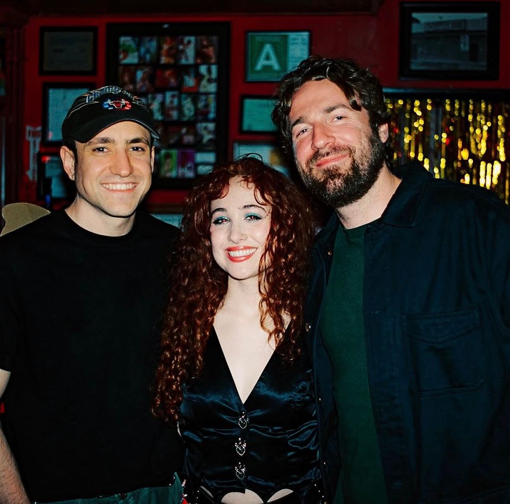 Photo of Chappell Roan at Chappell's 27th birthday party. She had 2 guys standing with her.