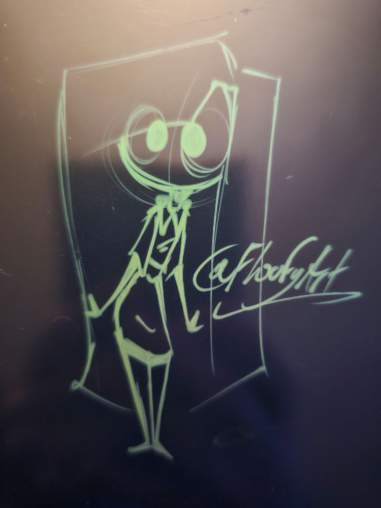 A doodle of an animation test character on a "boogie board" 