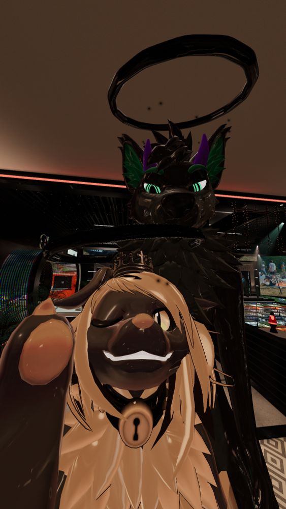 Selfie from VRChat with Notkea Sketch and Seif Doggo. Notkea winking with a smile and Seif looking down at the pubby.