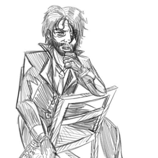 A middle-aged man with curly black hair and a thin trimmed beard sits backwards on a chair. He is wearing a white button-up, a tie, a black jacket, black slacks, and sneakers. He is holding his head up with his hand, arm propped against the back of the chair. His other hand dangles from his side holding a magazine.