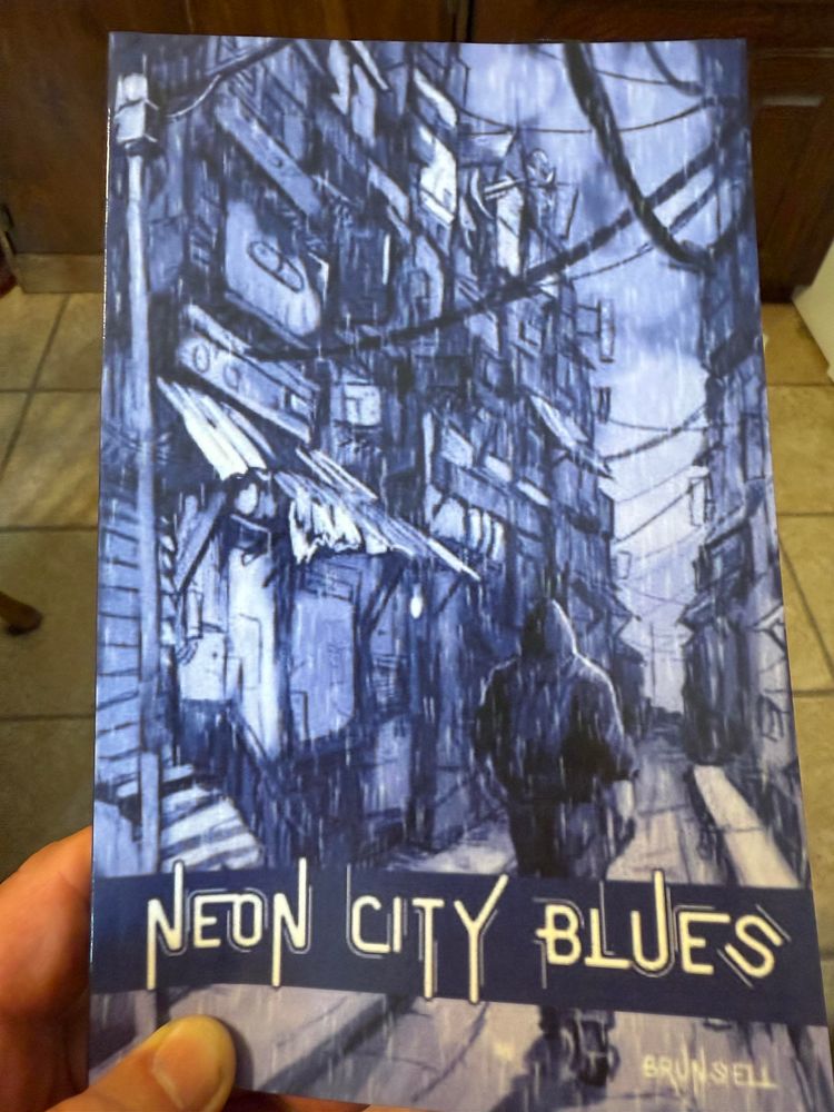 A book cover titled "Neon City Blues," featuring an illustration of a lone figure walking down a rain-soaked alley amidst shadowy buildings and overhead wires, predominantly in blue tones.