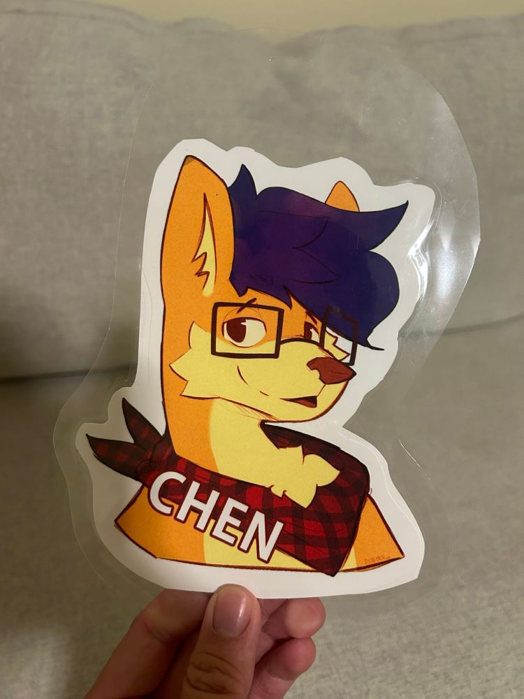 A badge of my corgi sona smiling in his og colors