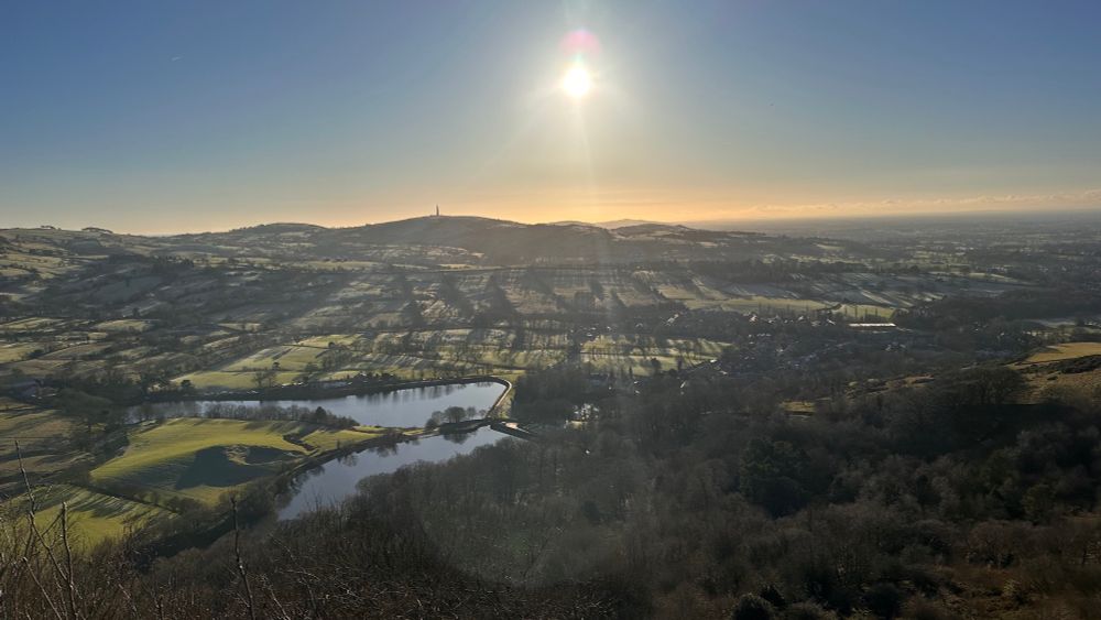 Landscape views of Macclesfield Forest and Teggsnose and Bottoms Reservoirs, on a sunny frosty day, from a viewpoint at Tegg’s Nose Country Park 