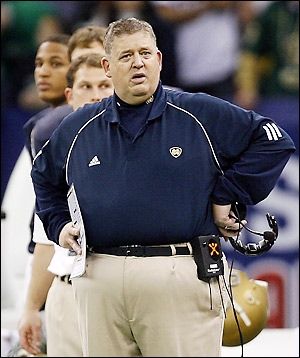 Charlie Weis looking sad on the Notre Dame sideline. Not pictured: 8,000 students with vacant soulless stares and broken hearts