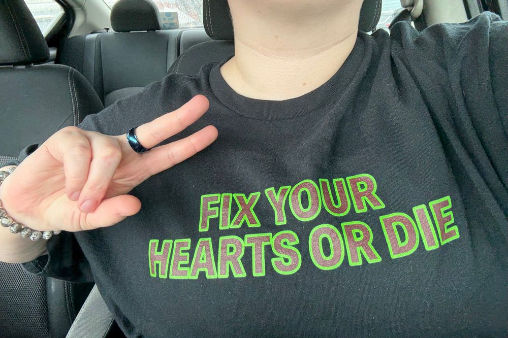 Photo of my tshirt, you can’t see my face. My shirt says “fix your hearts or die” in the Twin Peaks font