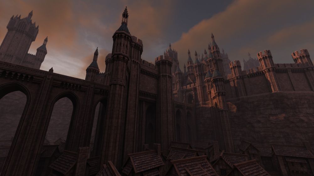 screenshot of a long stone bridge overshadowing a medieval town. the bridge has a gatehouse in the middle, which leads to the entrance of a castle