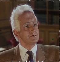 picture of a big headed alien humanoid
