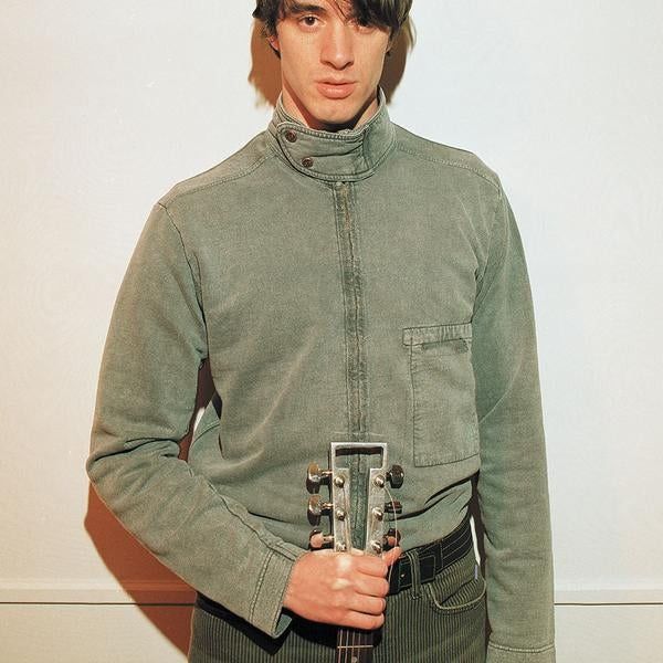 The cover of Criteria's En Garde showing lead singer/guitarist Steve Pederson holding a Travis Bean TB1000 guitar I would chop off a working testicle to own.