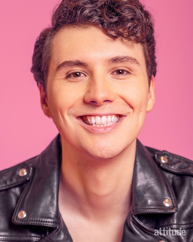 dan in a black leather jacket and smiling to the camera