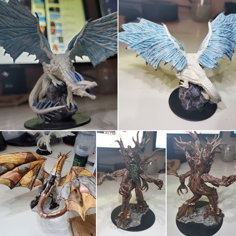 Pictures of in progress painting jobs of Dragons and Tree giants.