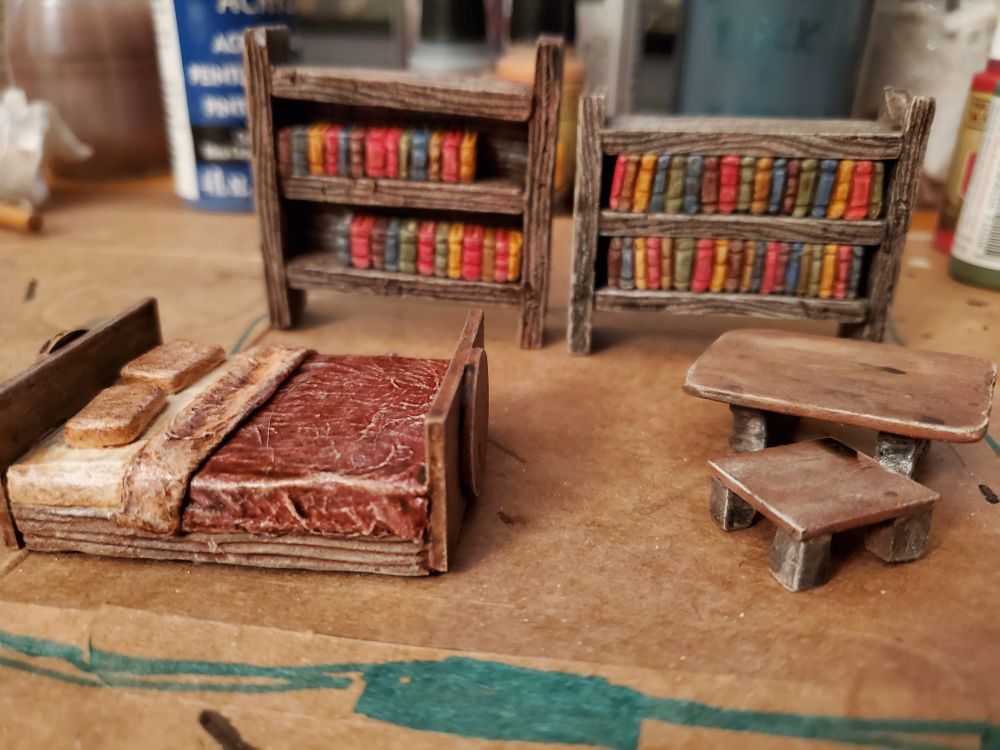 Handcrafted Bed, Bookshelves and tables for DnD use.