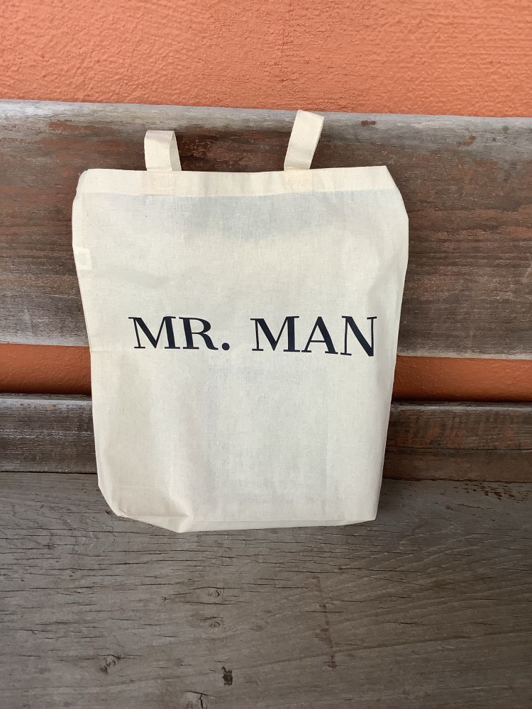 Custom canvas book tote imprinted with the moniker of one of my alter egos, “MR. MAN”