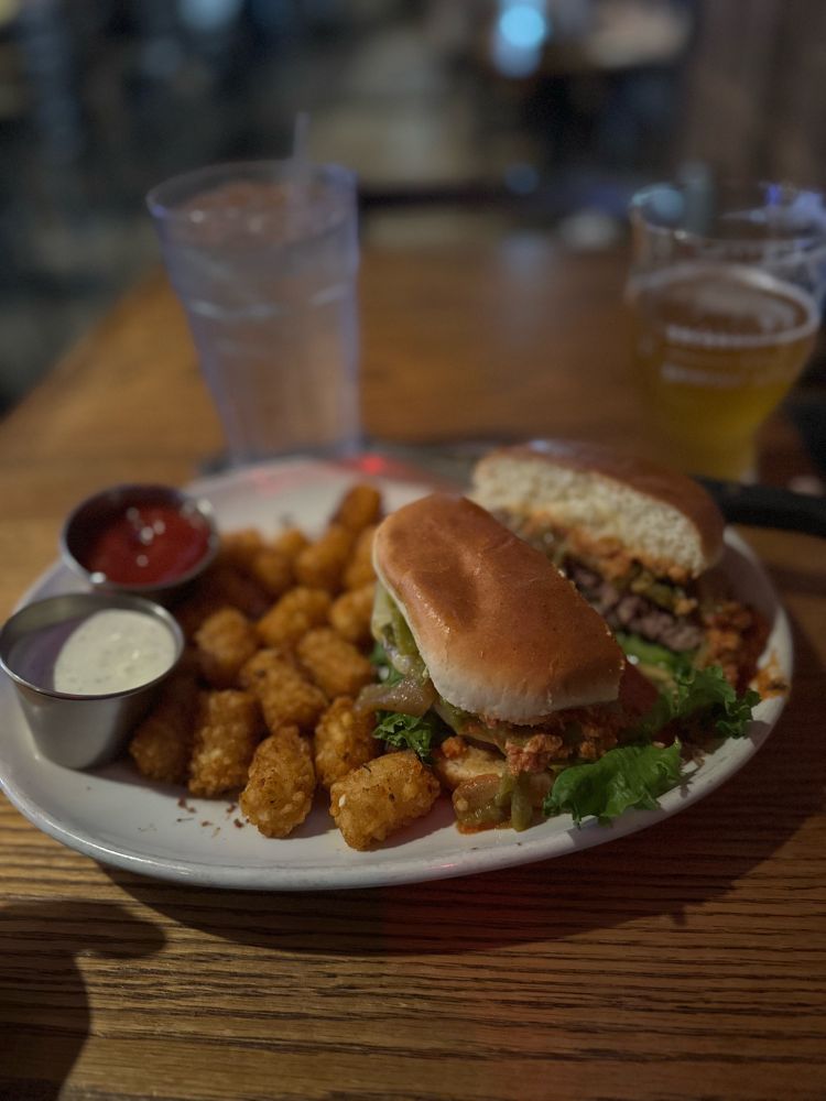 Medium well green chili burger with a HefeWeisen beer and seasoned tater tots. A salute to myself for a successful week. 