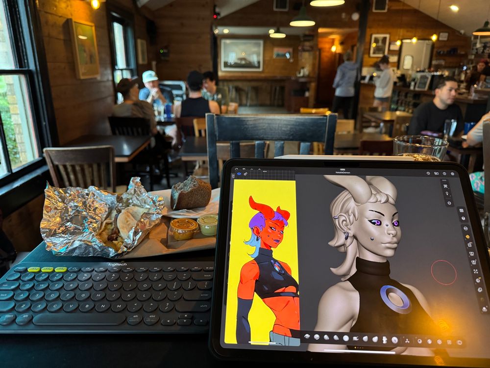 Cafe shot of a red demoness wielding a sword while wearing street clothes with a breakfast taco!
