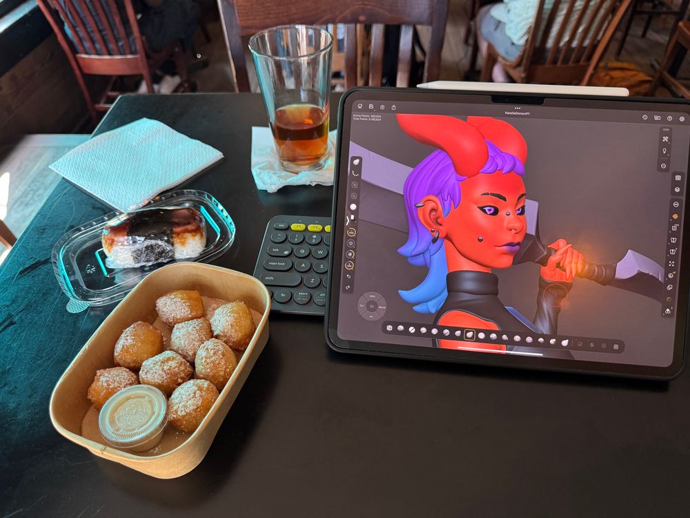 Cafe shot of a red demoness wielding a sword while wearing street clothes with a spam masubi and small donut holes