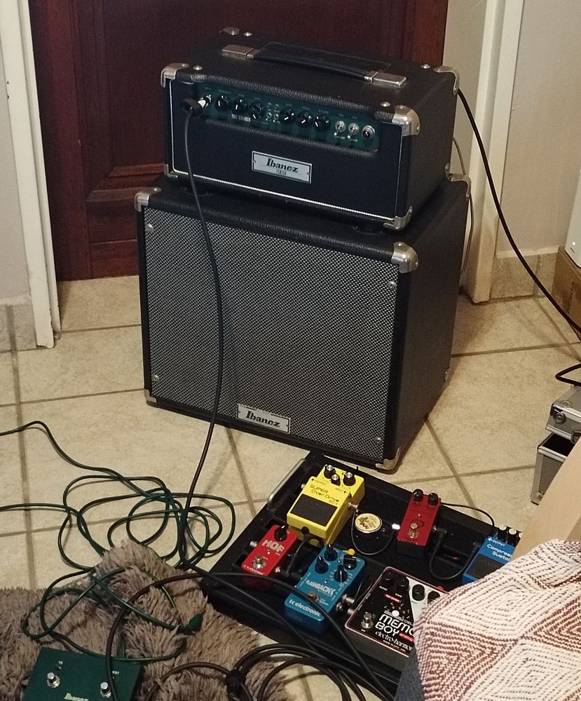 An Ibanez TSA15H amplifier with some guitar pedals in front of it. 