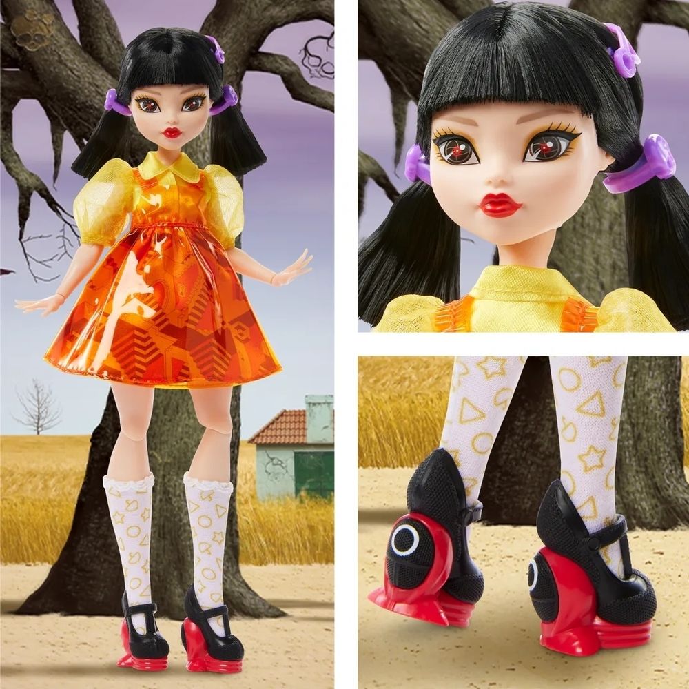 A monster high Young-Hee doll, she has an orange dress with yellow sleeves, and long socks with shapes on them. Her eyes glow red like her layers. Her shoes are the O masks from Squid Games guards 
