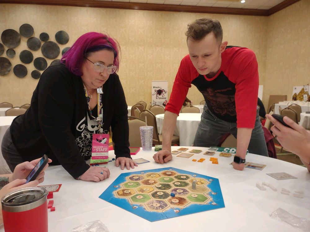 Donna & Jacob playing Catan