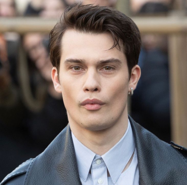 The blonde guy from Red, White, and Royal Blue, but it’s like a red carpet photo of the actor not prince Henry. And he has dark hair, so like.. I think he dyed it for the movie. Anyways, the point is he is SUCKING IN his cheeks. Like models do. Called mewing, I think. But it’s intense. Looks like bad buccal fat removal.