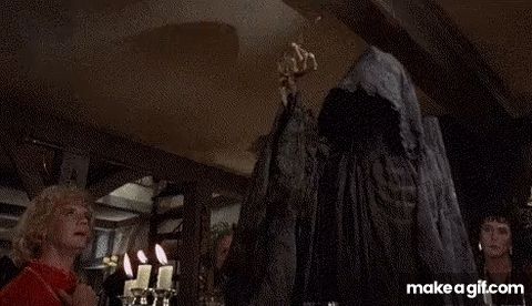 A gif of the grim reaper pointing at the salmon mousse, from Monty python's meaning of life film