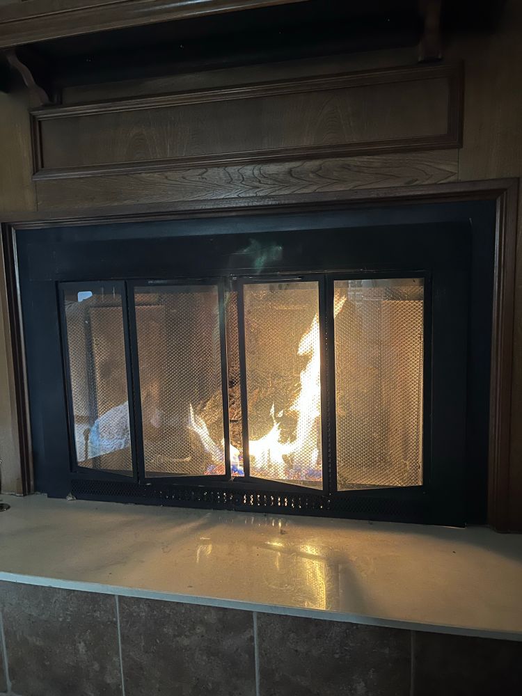 Gas fireplace going.