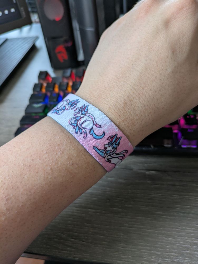 The other side of my reversible wristband showing a cute design with shiny Sylveon