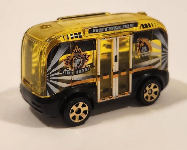 A Matchbox toy self driving electric bus