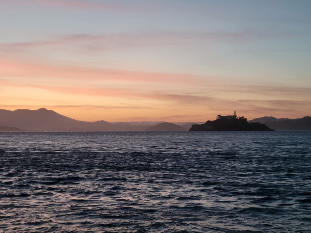 A sunset view of Alcatraz island off the coast of California