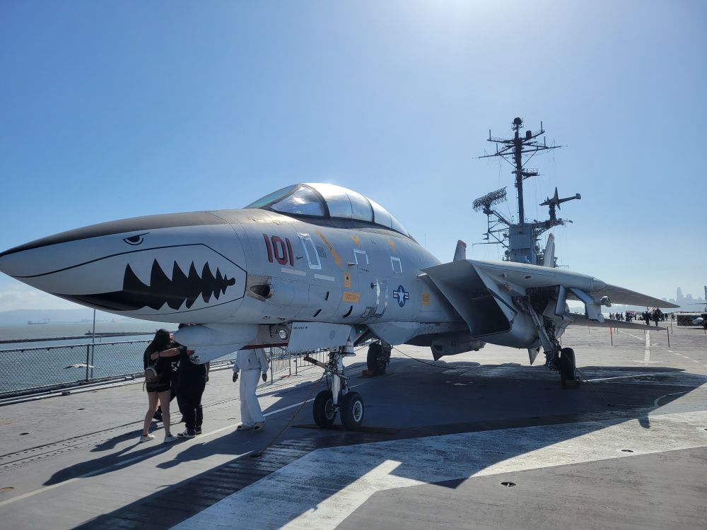 An F-14 Tomcat on the bow of the U.S.S. Hornet