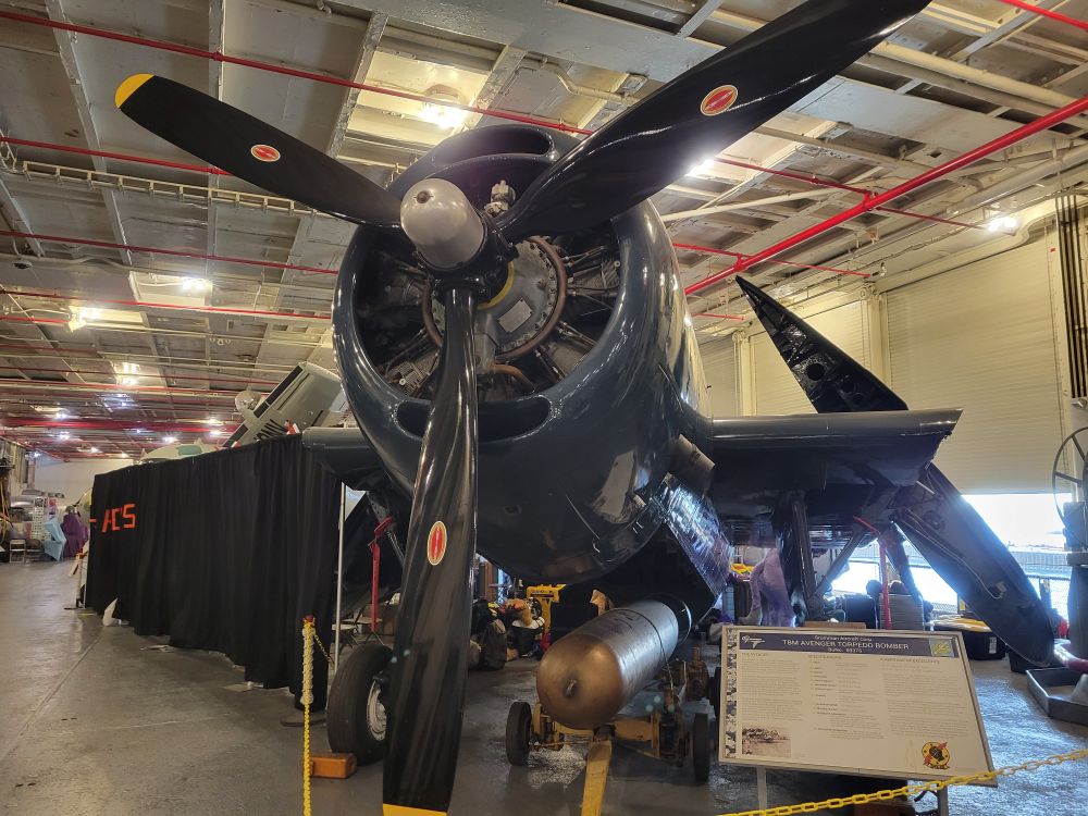 A TBM Avenger world war 2 torpedo bomber in the hanger on the carrier