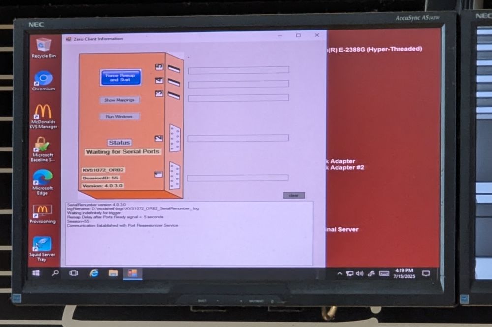 Display screen in a McDonald's restaurant showing a windows desktop with all kind of internal tools