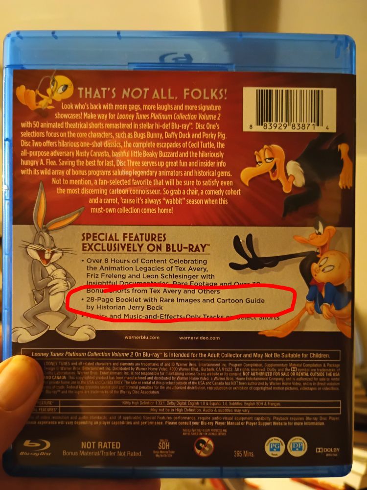 Back of disc box, with "28-page booklet with rare images and cartoon guide by historian Jerry Beck" circled.