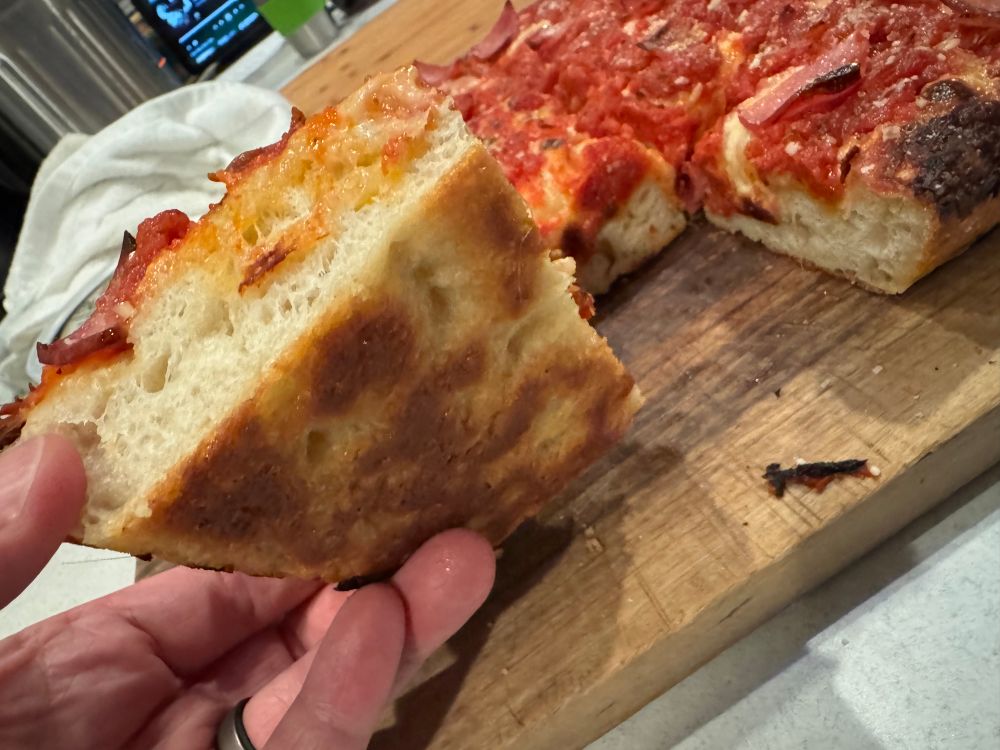 The underside of the pan pizza
