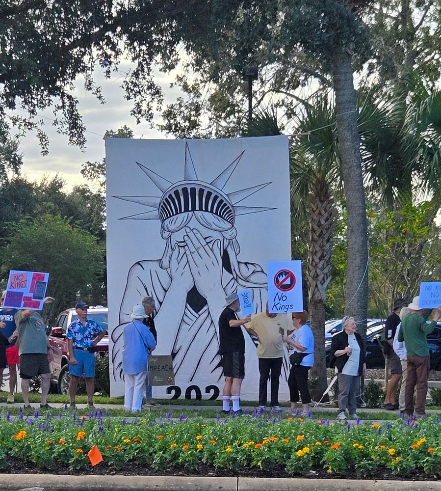 Weeping Statue of Liberty sign