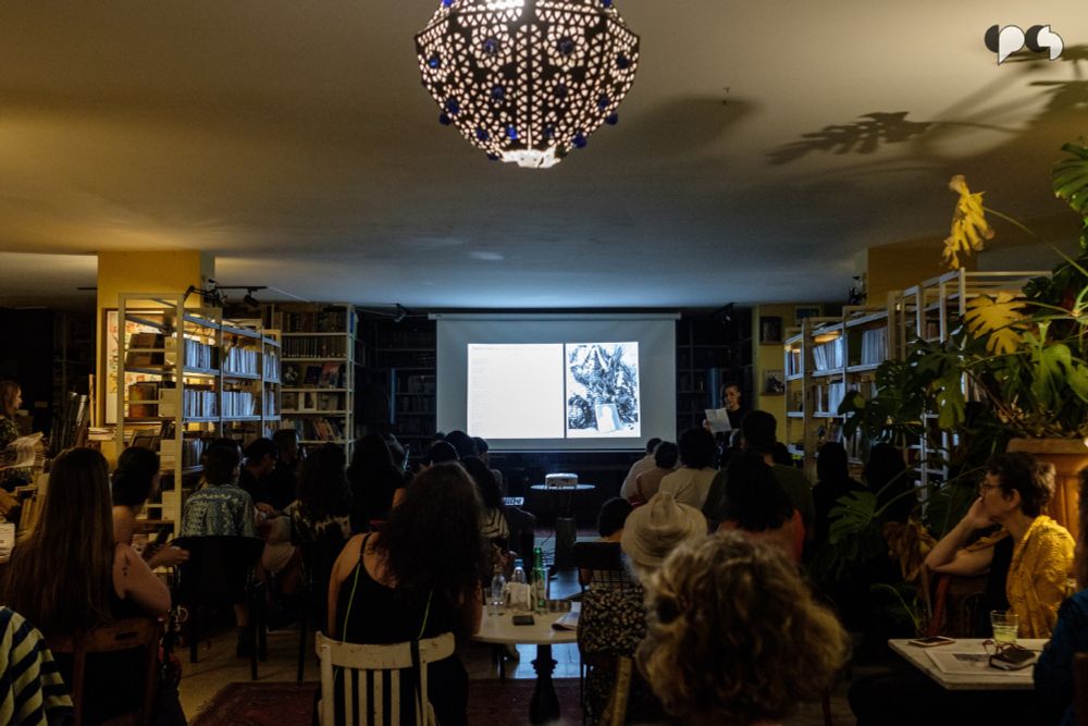 Image showing crowd of attendees listening to a speaker during the event at the Barzakh Bookshop. 
Photography: Rita Kabalan