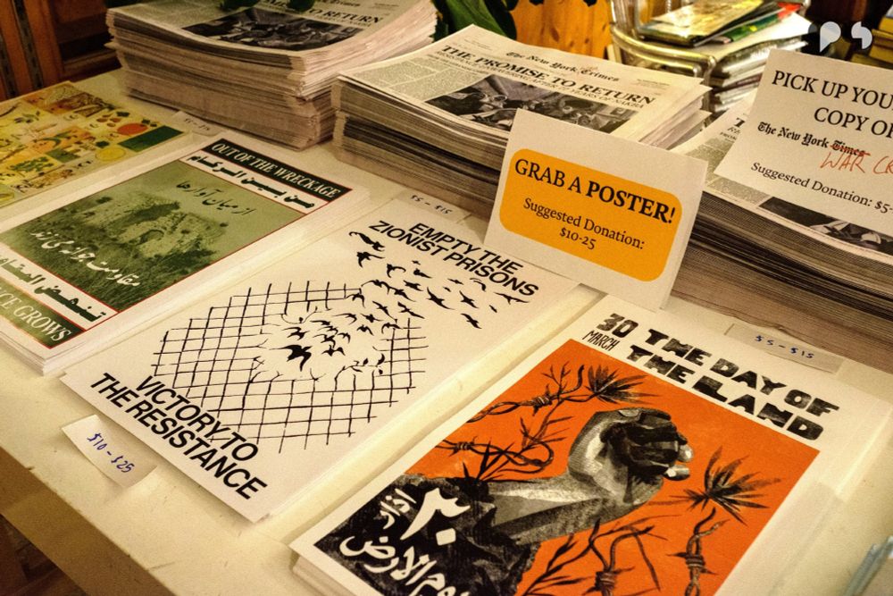 Stacks of newspaper copies of the New York War Crimes issue #17 as well as a selection of posters on display at the Barzakh Bookshop, to grab for a suggested donation. 
Photography: Rita Kabalan