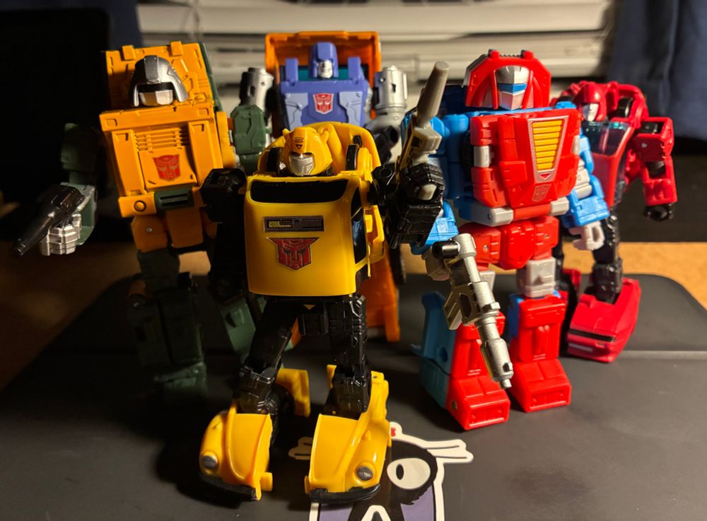 Recent toys of Autobots Bumblebee , Brawn, Huffer, Gears and Cliffjumper in 1984 retro themes.
