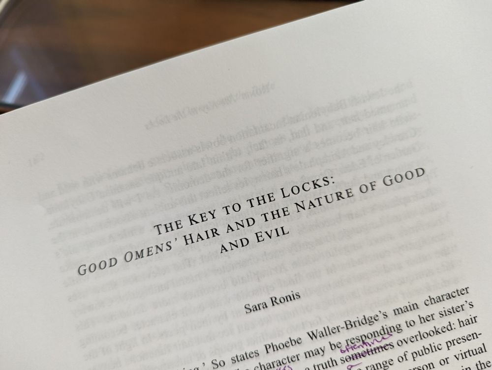 A photograph of the title of article proofs. The title is "The key to the locks: good omen's hair and the nature of Good and evil".