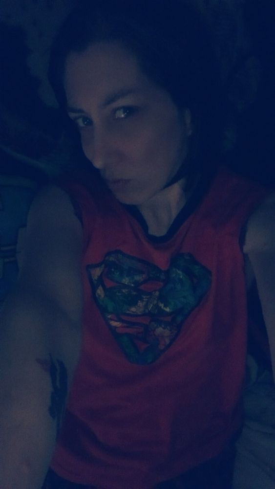 Low light filter picture of myself. Red Superman tank top and Spider-Man boxers.
