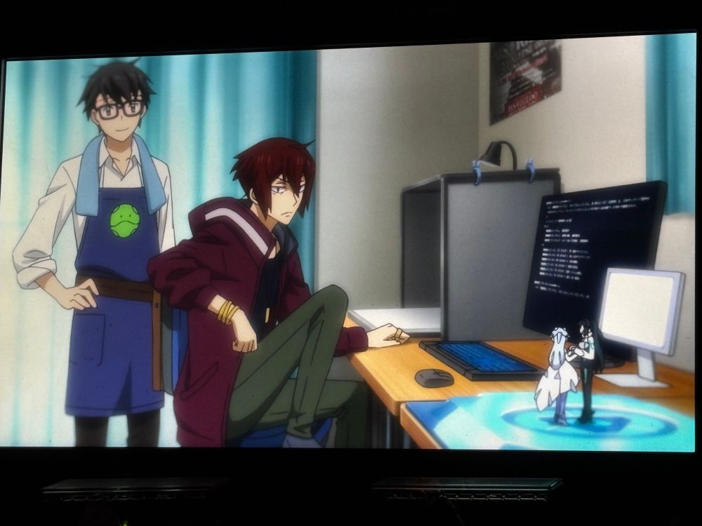 Koichi and Tsukasa from Gundam Build Divers staring at Sara and Mei standing on a table