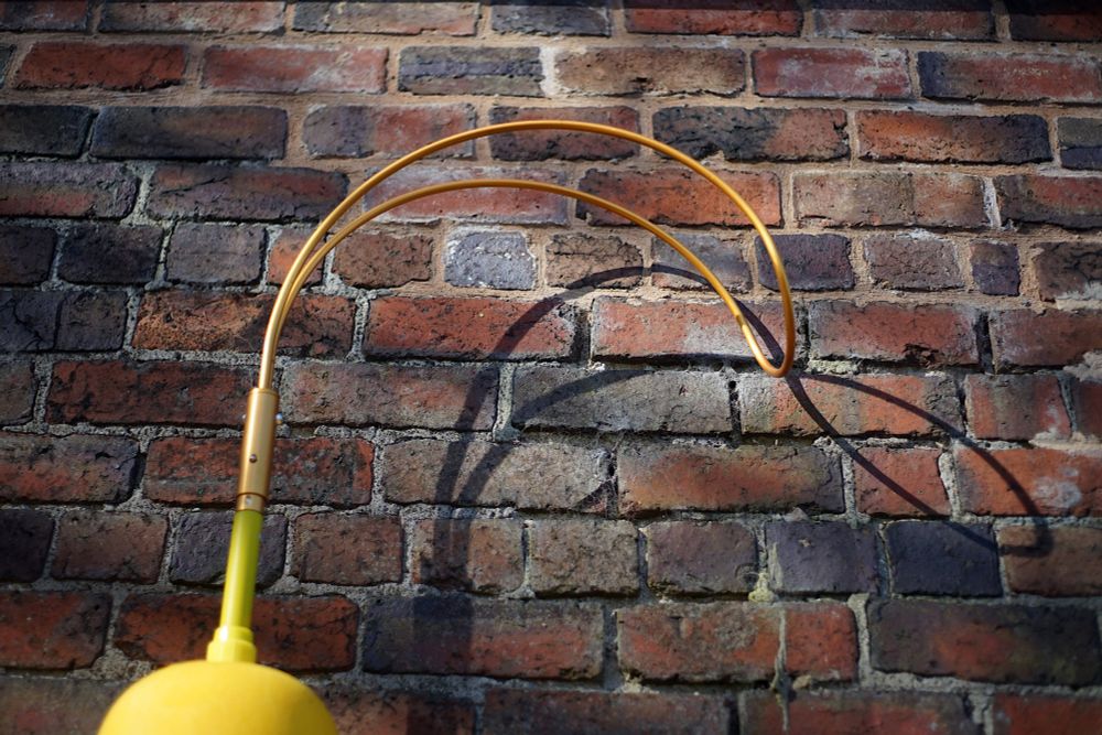 A hook against a brick wall, used for life saving on the reservoir 