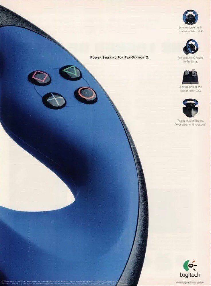 Close-up of Logitech racing wheel with PlayStation buttons for PS2 force feedback driving.